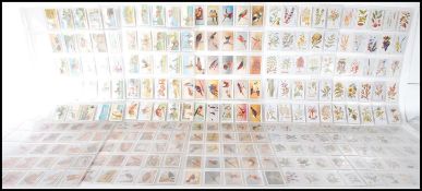 Gallaher cigarette trade card sets to include Plants of Commercial Value (100 cards), Zoo Tropical