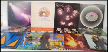 A collection of vinyl long play LP records together with some 12