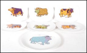 A group of seven vintage retro 20th Century English Ironstone vibrantly decorated plates from the