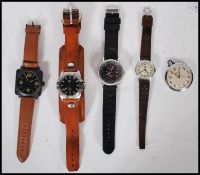A group of gentleman's wrist watches to include makes form CAT stainless-steel YF141 water-resistant