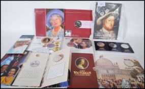 A collection of commemorative crowns / £5 coins to include an Isle Of Man Thames Diamond Jubilee