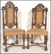 A pair of 19th century walnut Carolean revival hall chairs. Each raised on turned legs with