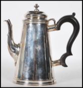 An early 20th Century silver hallmarked Edwardian Britannia silver chocolate pot / coffee jug of