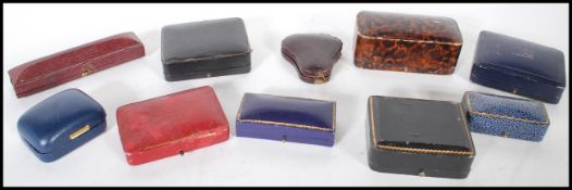 A collection of ten vintage early to mid 20th Century jewellery boxes all finished in leatherette in