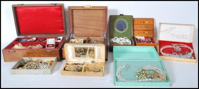 A large collection of 20th century costume jewellery to include enamel and stone set yellow and
