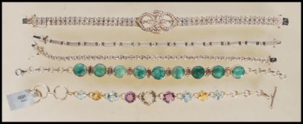 A collection of stamped 925 ladies silver bracelets to include a dress bracelet set with white