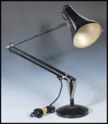 A vintage 20th Century Herbert Terry Anglepoise industrial desk lamp finished in black enamel