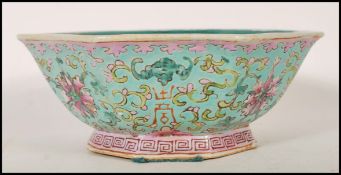 A Chinese Cantonese ( Canton ) footed centerpiece bowl of octagonal form having a blue ground