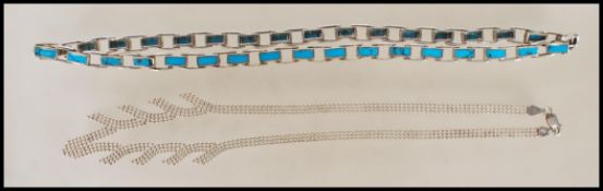Two silver necklaces to include a stamped 925 turquoise panel spacer necklace and a stamped 925