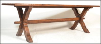 An excellent solid oak monastic refectory dining table in the Jacobean manner of long, large form.