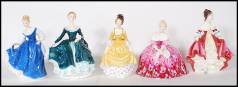 A collection of Royal Doulton ceramic figurines to include Southern Belle HN 1957, Kay HN 3340,