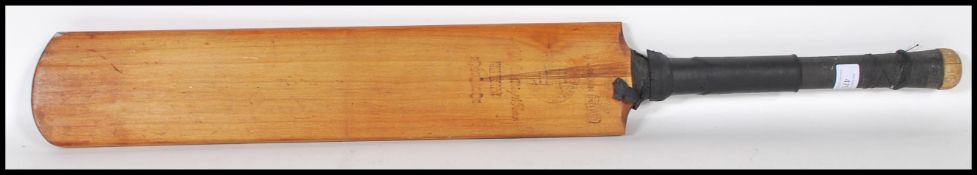 A mid 20th Century Spalding & Bros signed cricket bat, the cricket bat signed by the 1949 New