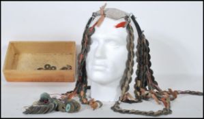 A large selection of Chinese coins to include a selection of ages, having square cut centres and