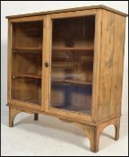 A 19th Century Victorian Industrial office library glazed scrubbed pine bookcase. The reeded edge
