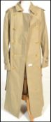 Burberry - a vintage ladies' classic trench coat with notched lapel collar and storm flap on the