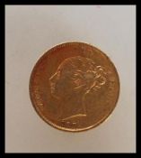 A Victorian 22ct gold 1872 gold half sovereign having a young Victoria head facing left with a
