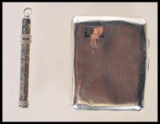 A vintage early 20th Century W Wilkinson Ltd silver hallmarked vesta case having engine turned