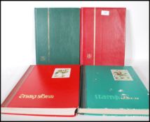 A large collection of 20th Century decimal stamps across four large albums, most of the stamps being