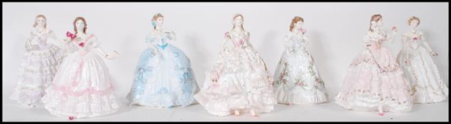 A collection of Royal Worcester ceramic figurines modelled as ladies to include The First