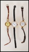 A group of three hallmarked 9ct gold ladies wrist watches dating from the 19th Century. Two having