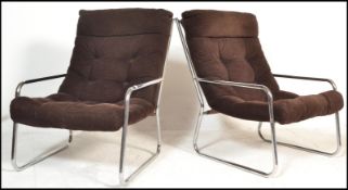 A pair of retro 20th Century cantilever chrome tubular framed lounge / easy open framed armchairs in