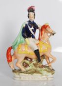 A 19th century Staffordshire flatback figurine of Louis Napoleon Emperor  of France on horseback.