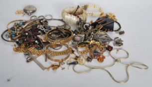A small collection of costume jewellery to include bracelets / bangles, necklaces, brooches,
