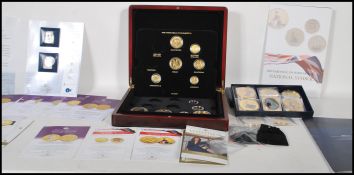 A collection of Commemorative coins to include £1 Banknote war time issue, £5 bank note White