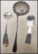 A selection of English hallmarked silver spoons to include a gadrooned caddy spoon (hallmarked