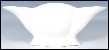 An early 20th Century Art Deco 1930's Fulham Pottery display vase of flared trefoil form being