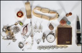 A collection of vintage costume jewellery and miscellaneous items to include brooches, necklaces,