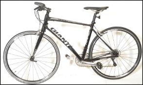 A Giant Aluxx fluidform Rapid Compact Road Design bicycle / bike. LIghtweight hybrid road bike in