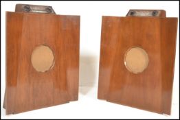 A pair of vintage 20th Century Murphy model 146 batwing floorstanding mains valve radios, the shaped