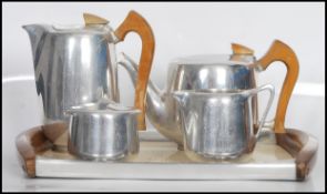 A vintage retro mid 20th Century Picquot Ware coffee/ tea service made from stainless steel and