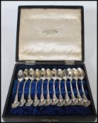 Arthur & Bond - Yokohama - A set of twelve early 20th Century Art Nouveau style sterling silver
