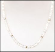 A good quality single strand cultured pearl necklace having a 9ct gold spring ring clasp with gold