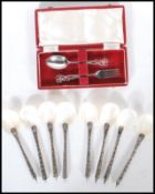 A silver hallmarked foliate pierced spoon and fork dessert cutlery set in original retailers box,
