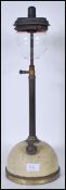 A vintage early 20th century industrial Tilly paraffin table top lamp having a domed base with
