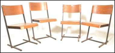 A set of 4 mid 20th century Art Deco style bentwood and tubular metal industrial stacking chairs.