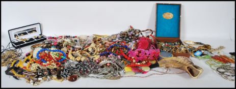 A large collection of vintage / retro 20th Century costume jewellery to include clip on earrings,