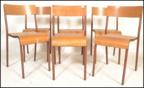A set of 6 mid 20th century bentwood and tubular metal industrial stacking chairs. Each with painted