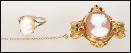 A 19th Century Victorian cameo brooch. The brooch having a carved shell cameo bust of a maiden