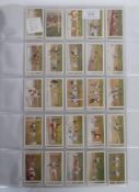 A full set of 100 Gallaher's Footballers cigarette trade cards preserved in a plastic wallet and