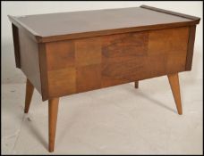 An early to mid 20th Century walnut work box / sewing box of low form, hinged top opening to