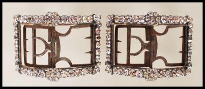 A pair of 19th Century antique shoe buckles of rectangular form set with round cut paste stones.
