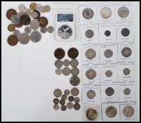 A collection British coins dating from the 19th Century to include several graded coins to include