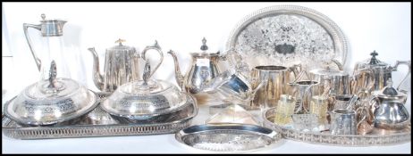 A large collection of early 20th Century silver plated dinner and tea ware, to include reeded design