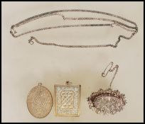 Two silver hallmarked ingot pendant pendants to include a square celtic knot design marked St