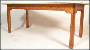 A vintage mid 20th Century farmhouse refectory dining table, the vintage flared geometric patterned