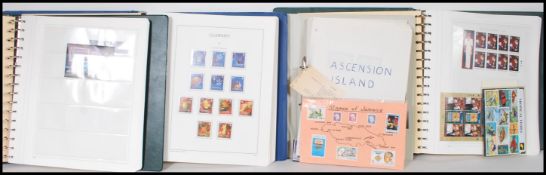 A collection of 20th century Guernsey and Ascension Island stamps most post decimal and mint